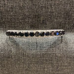 Black Spinel stainless steel hinged bracelet.
